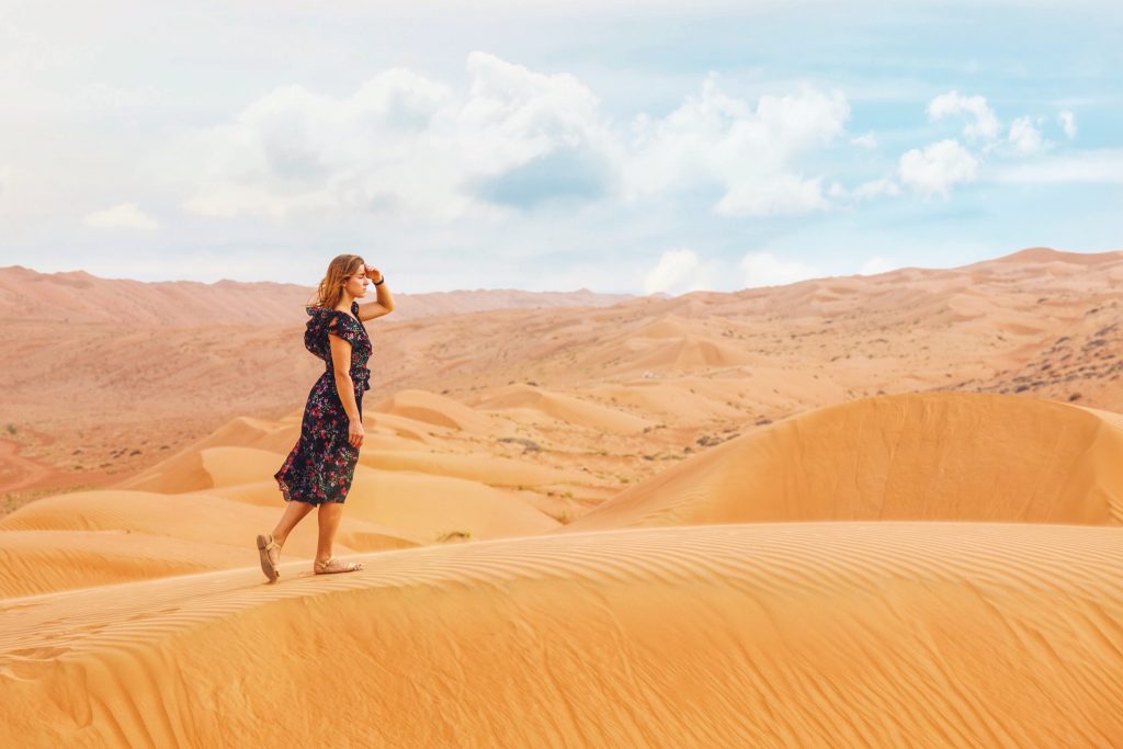 woman in desert searching